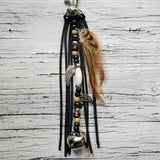 Love my customer's latest creation of Custom Trail Riding Saddle Bells with beads, charms, and feathers. She added 3 different angel wings in memory of 3 horses that were very dear to her heart. Should look pretty fancy on her saddle.